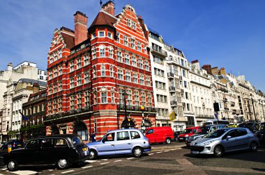 Busy street corner in London clipart