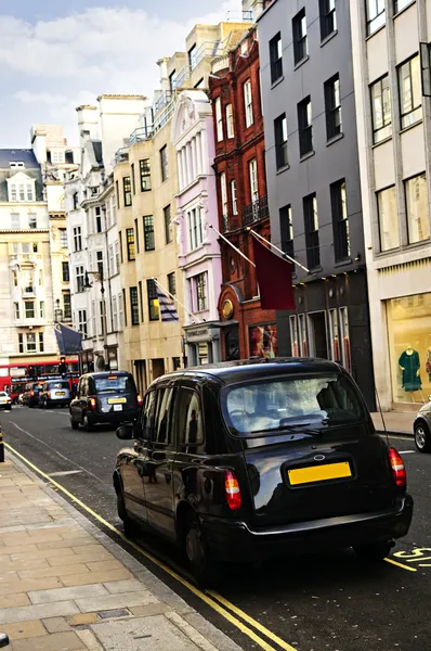 London taxi on shopping street — Stock Photo, Image