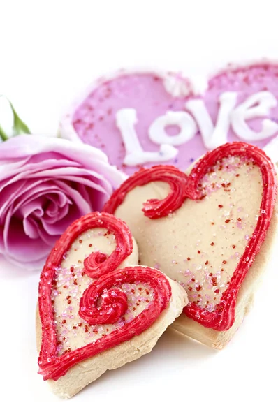 Biscotti di San Valentino e rosa — Foto Stock