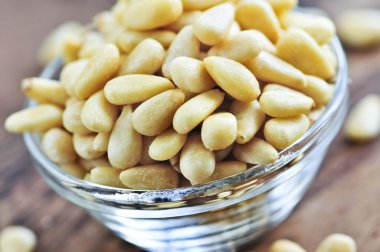 Pine nuts in glass bowl clipart