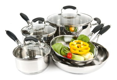Stainless steel pots and pans with vegetables clipart