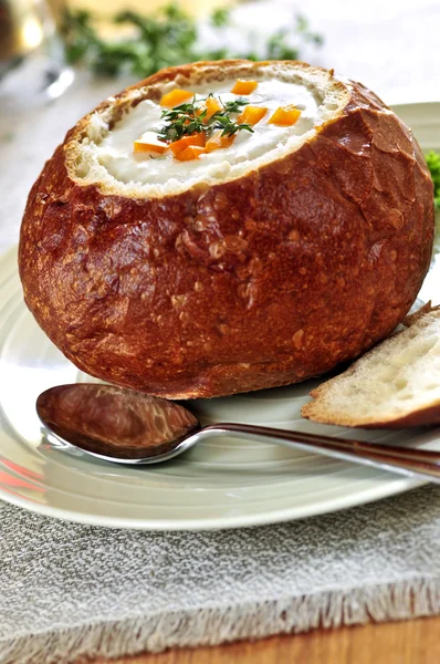 Soup in bread bowl — Stock Photo, Image