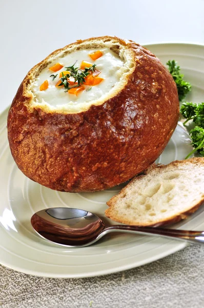 Soup in bread bowl — Stock Photo, Image
