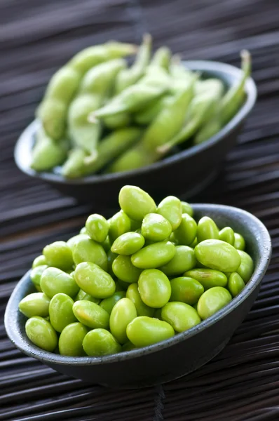 Soy beans in bowls — Stock Photo, Image