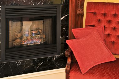 Fireplace and red chair clipart