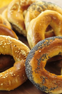 Variety of fresh Montreal style bagels close up clipart