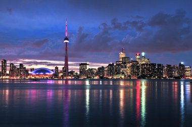 Scenic view at Toronto city waterfront skyline at night clipart