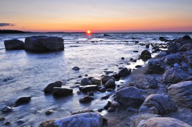 Sunset at the rocky shore of Georgian Bay, Canada. Awenda provincial park. clipart
