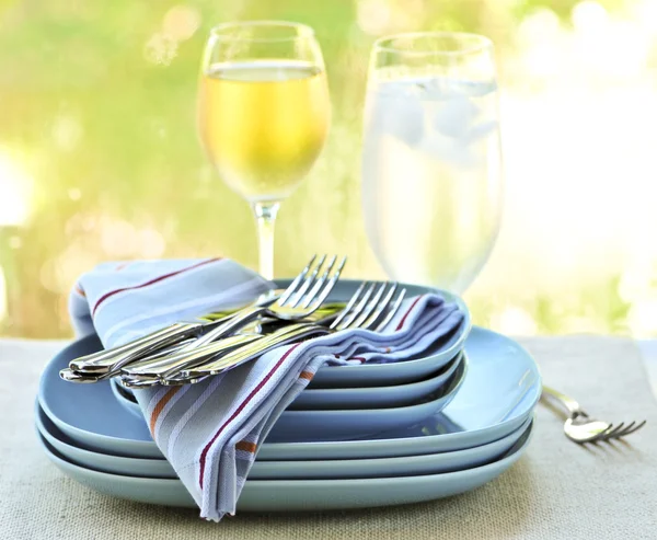 Plates and cutlery — Stock Photo, Image
