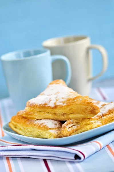 Apple Turnovers Pastries Coffee Cups Background — Stock Photo, Image