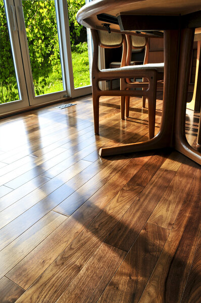 Hardwood walnut floor in residential home dining room
