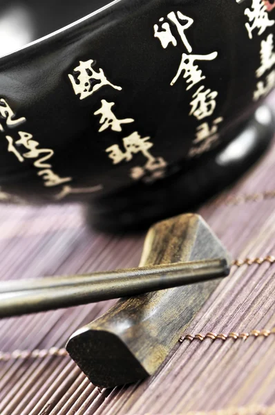 Rice bowl and chopsticks — Stock Photo, Image