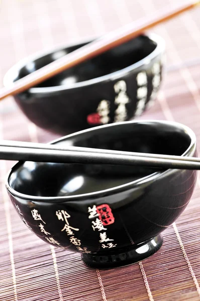 Rice bowls and chopsticks — Stock Photo, Image
