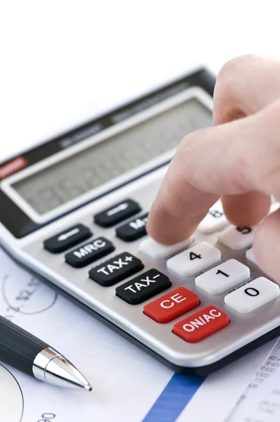 Податковий калькулятор і ручка — стокове фото