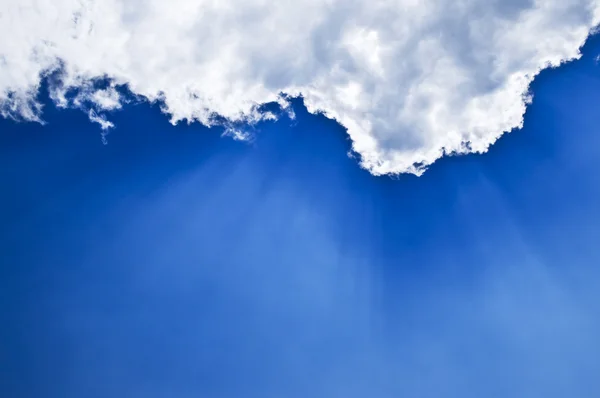 Blue sky with sunrays — Stock Photo, Image