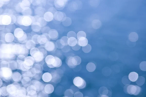 Out Focus Bokeh Background Blue Water Sun Reflections — Stock Photo, Image