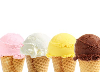 Assorted ice cream in sugar cones on white background clipart