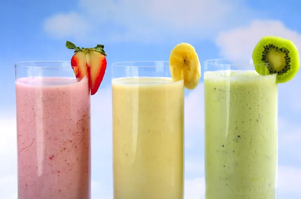 Assorted fruit smoothies Royalty Free Stock Photos