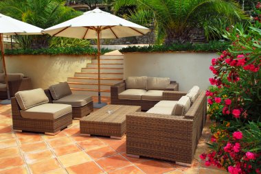 Patio of mediterranean villa in French Riviera with wicker furniture clipart