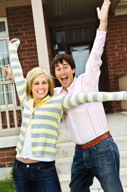 Excited couple at home clipart