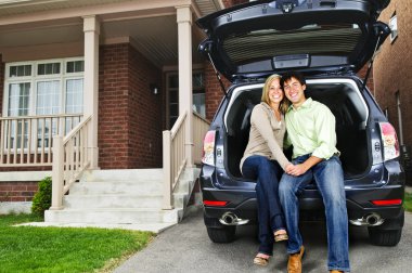 Couple sitting in back of car clipart