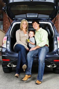 Couple sitting in back of car clipart