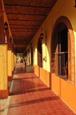 Covered sidewalk in Tlaquepaque shopping district in Guadalajara, Jalisco, Mexico clipart
