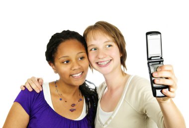 Teen girls with camera phone clipart