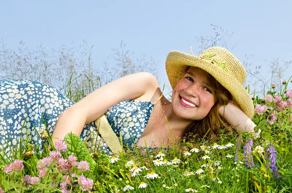 Young girl laying on meadow — Stock Photo, Image