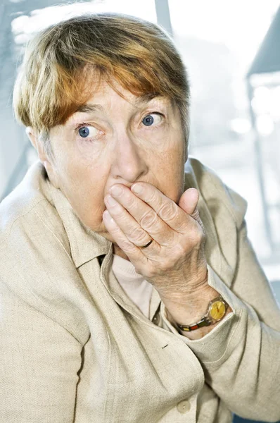 Scared elderly woman — Stock Photo, Image