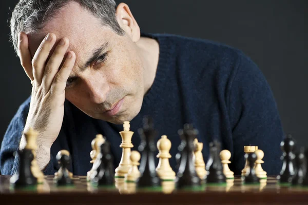 Man op schaakbord — Stockfoto