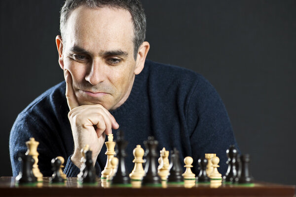 Man at chess board