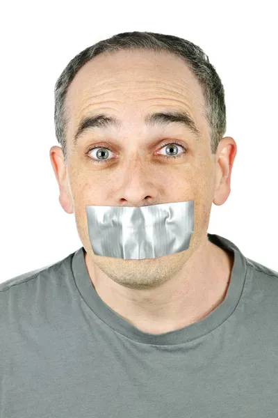 Hombre con cinta adhesiva en la boca — Foto de Stock