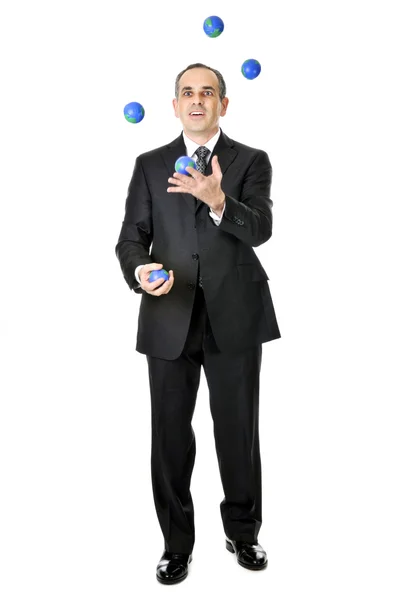 Άνθρωπος Των Επιχειρήσεων Στο Κοστούμι Juggling Πλανήτη Μπάλες — Φωτογραφία Αρχείου