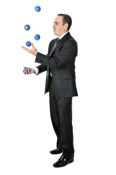 Businessman juggling — Stock Photo, Image