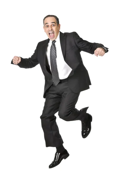 白い背景で隔離のスーツのビジネスマンをジャンプ — ストック写真