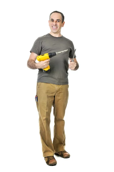 Handyman com uma broca e chave de fenda — Fotografia de Stock