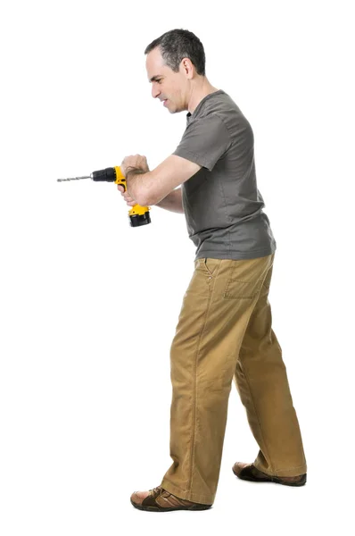 Strong Handyman Pushing His Cordless Drill — Stock Photo, Image