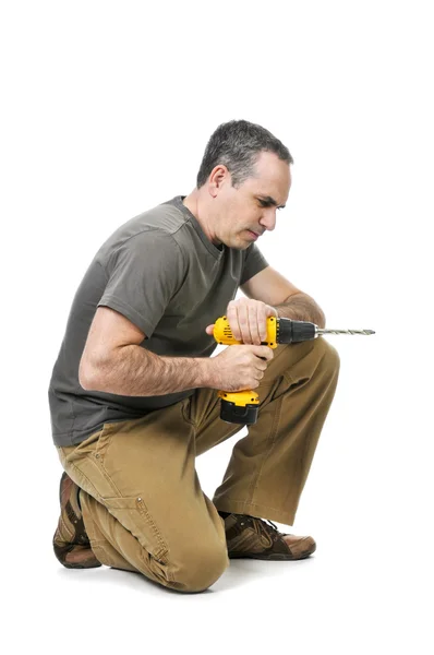 Handyman com uma broca — Fotografia de Stock