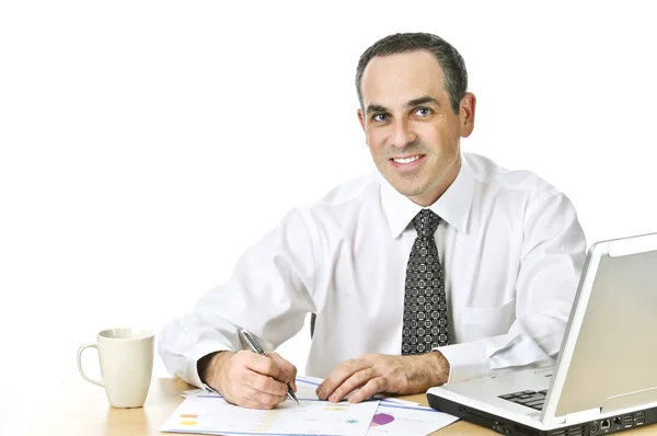 Happy Office Worker Reviewing Generic Reports His Desk Stock Photo