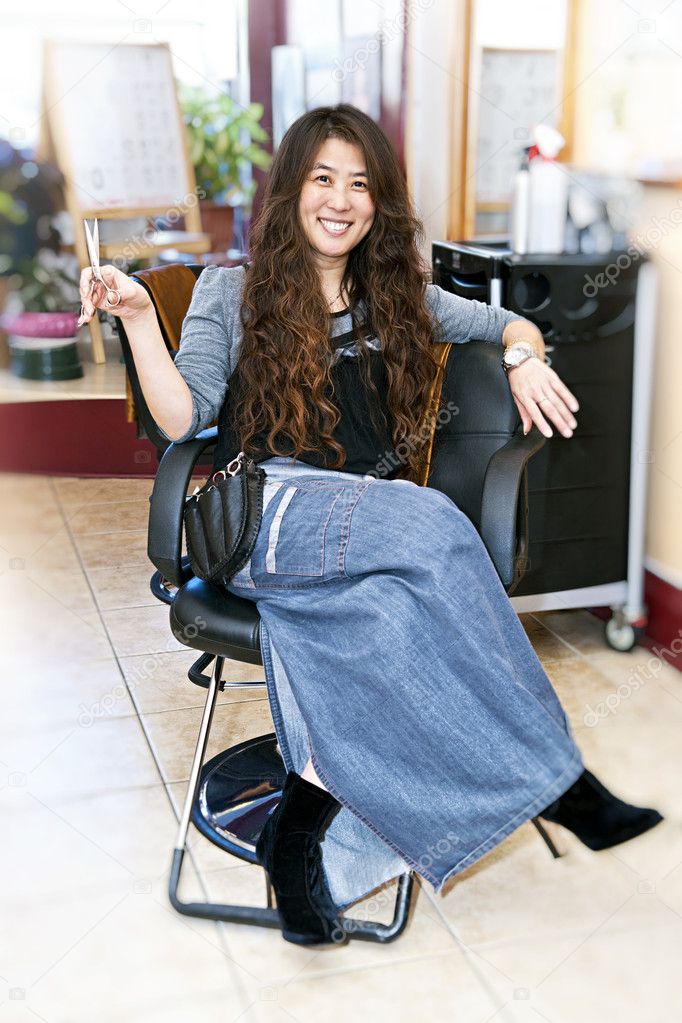 Hair stylist in salon