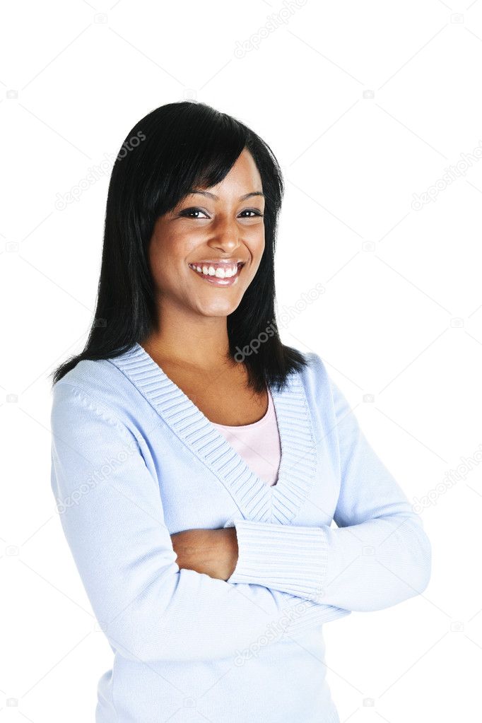 Smiling young woman with crossed arms