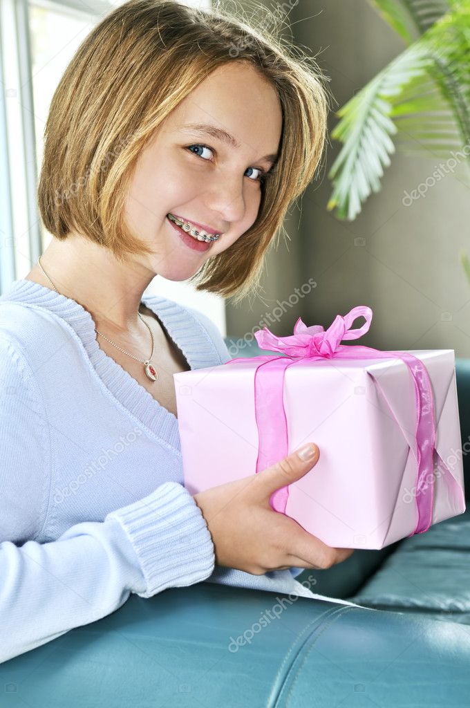 Teenage girl with present