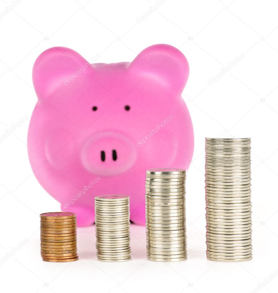 Piggy bank with coin stacks
