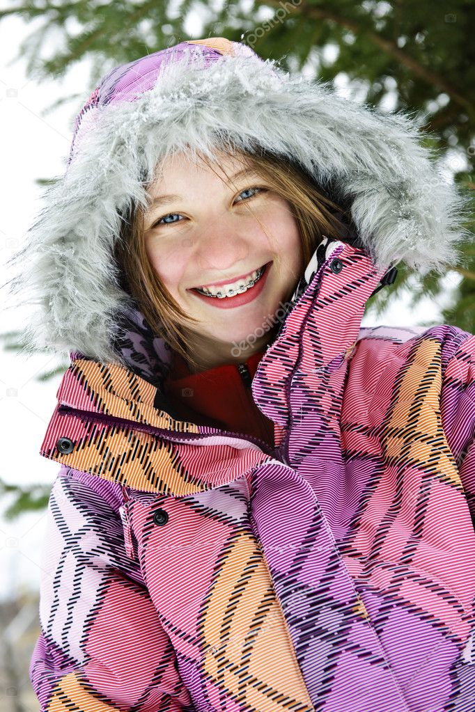 Happy winter girl in ski jacket — Stock Photo © elenathewise #4719612