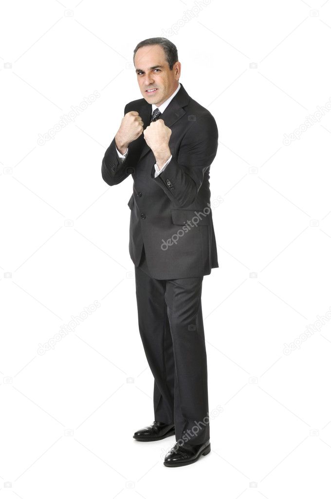 Businessman in a suit ready to fight isolated on white background