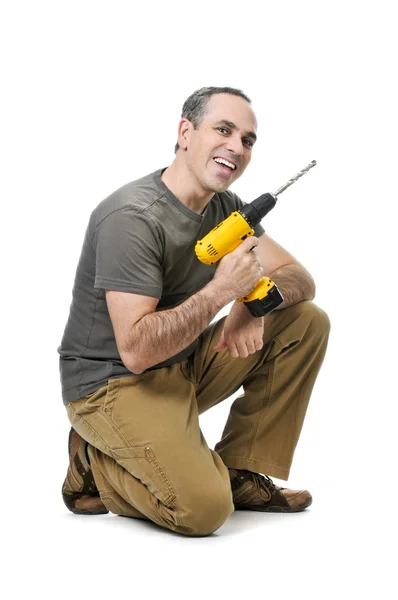 Kneeling Happy Handyman His Cordless Drill — Stock Photo, Image