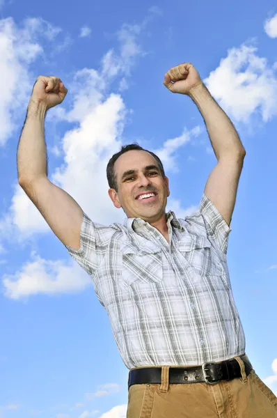 Щасливий Чоловік Середнього Віку Піднімає Руки Перемозі — стокове фото