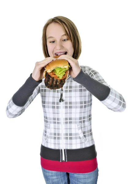 Dospívající Dívka Velký Hamburger Izolovaných Bílém Pozadí — Stock fotografie