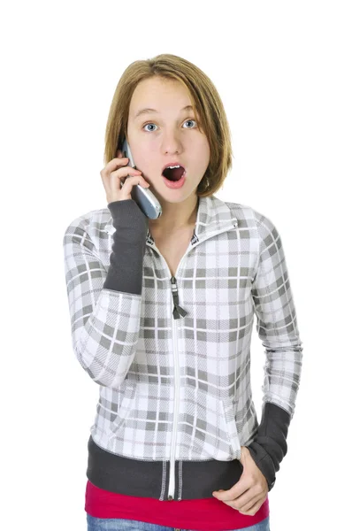 Teenage Girl Talking Cell Phone Acting Surprised Isolated White Background — Stock Photo, Image